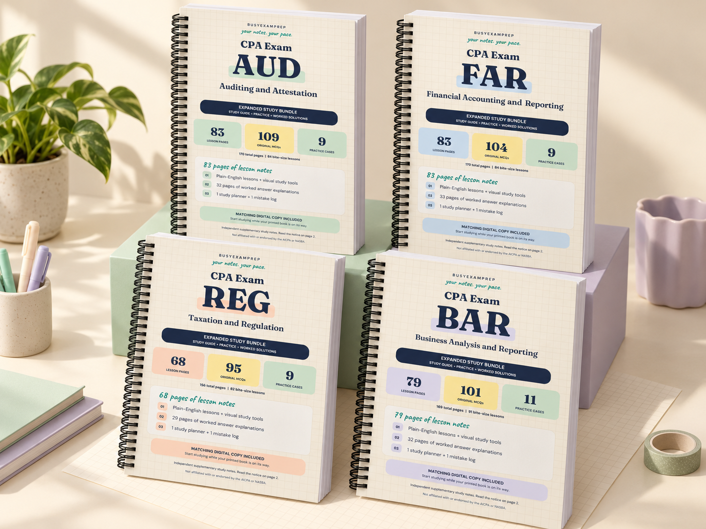 Realistic mockup of four coil-bound printed CPA study guides, AUD, FAR, REG and BAR, on warm cream and pastel studio blocks.